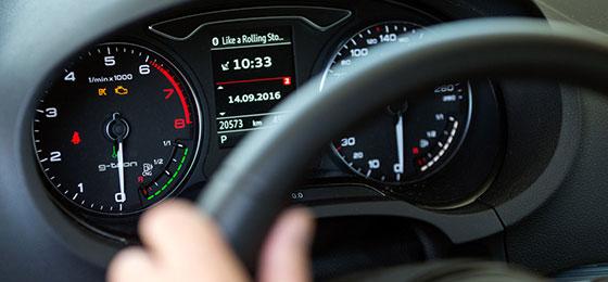 The picture shows the cockpit of a gas-powered vehicle.